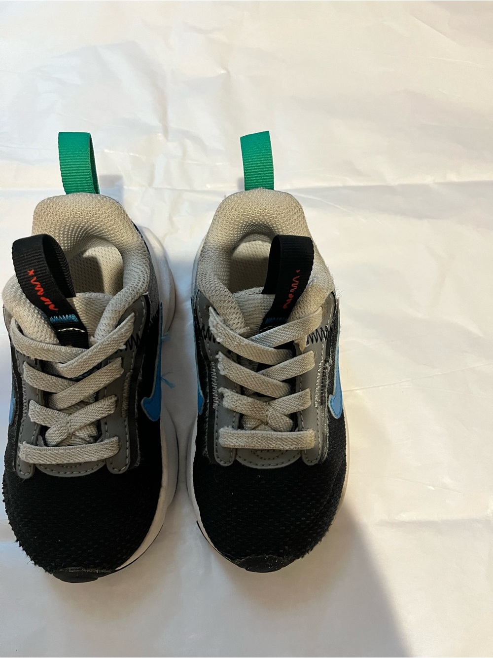 Nike Kids Black, Gray and Blue Athletic Sneakers with Teal Pull Tabs